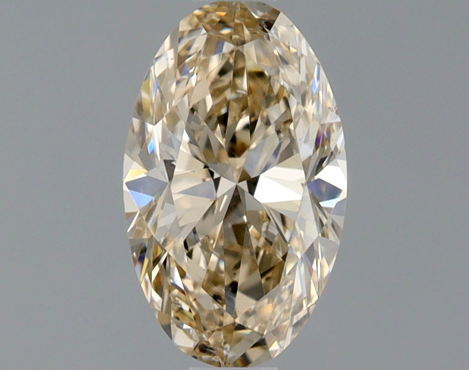 Oval 0.9 Ct. U-V,Light Brown SI1 -  VG G
