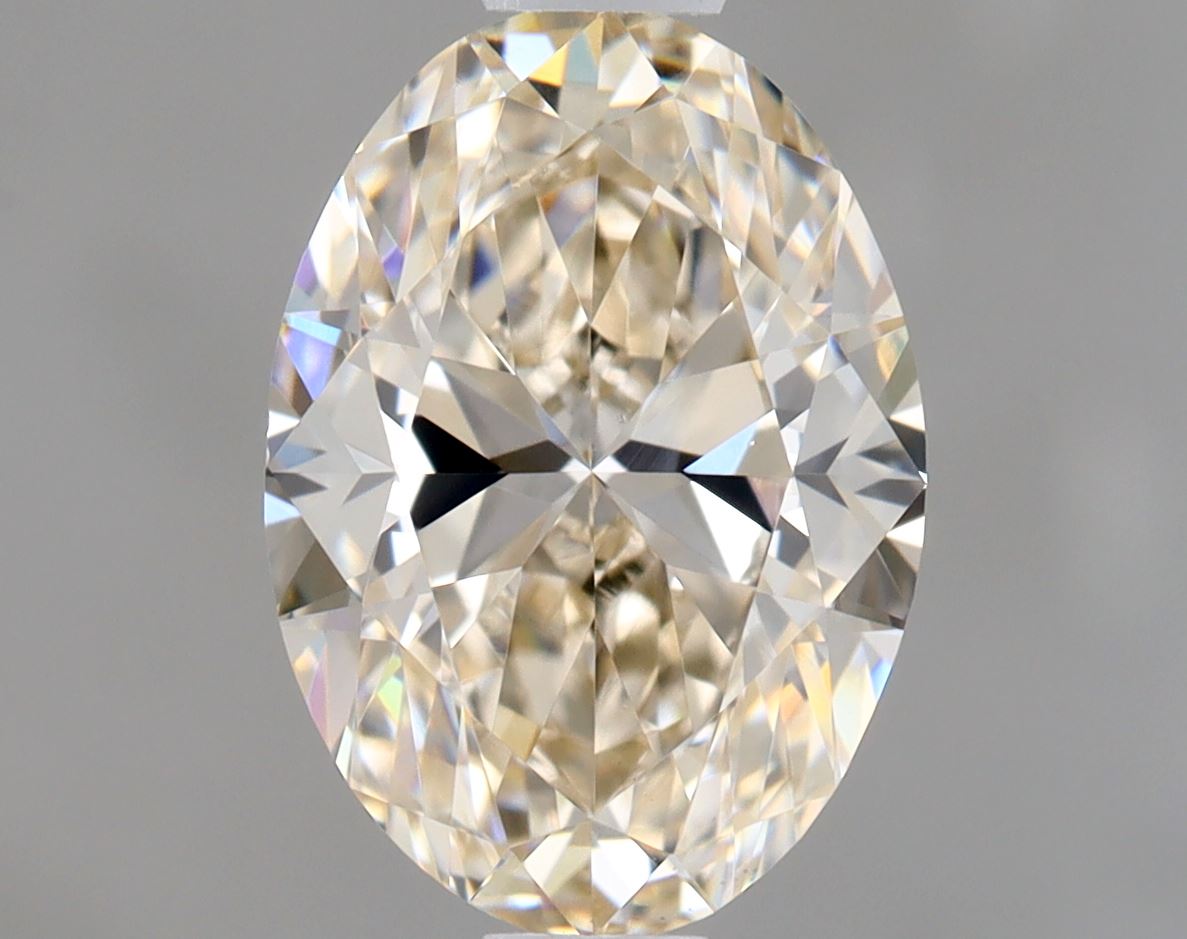 Oval 1.01 Ct. M,Faint Brown VS1 -  EX VG