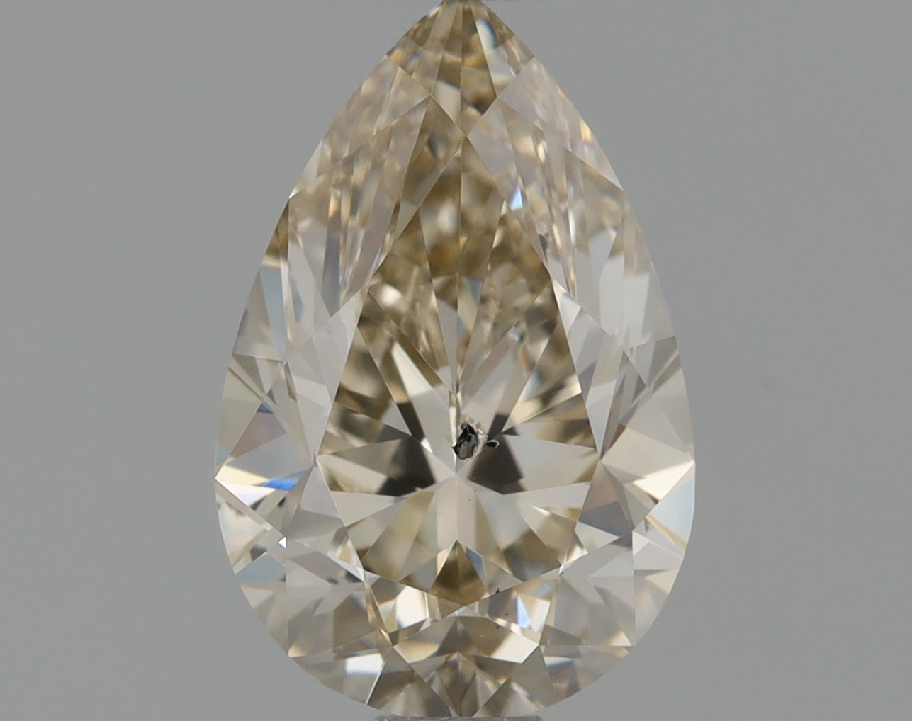 Pear 0.93 Ct. S-T,Light Brown SI2 -  VG VG